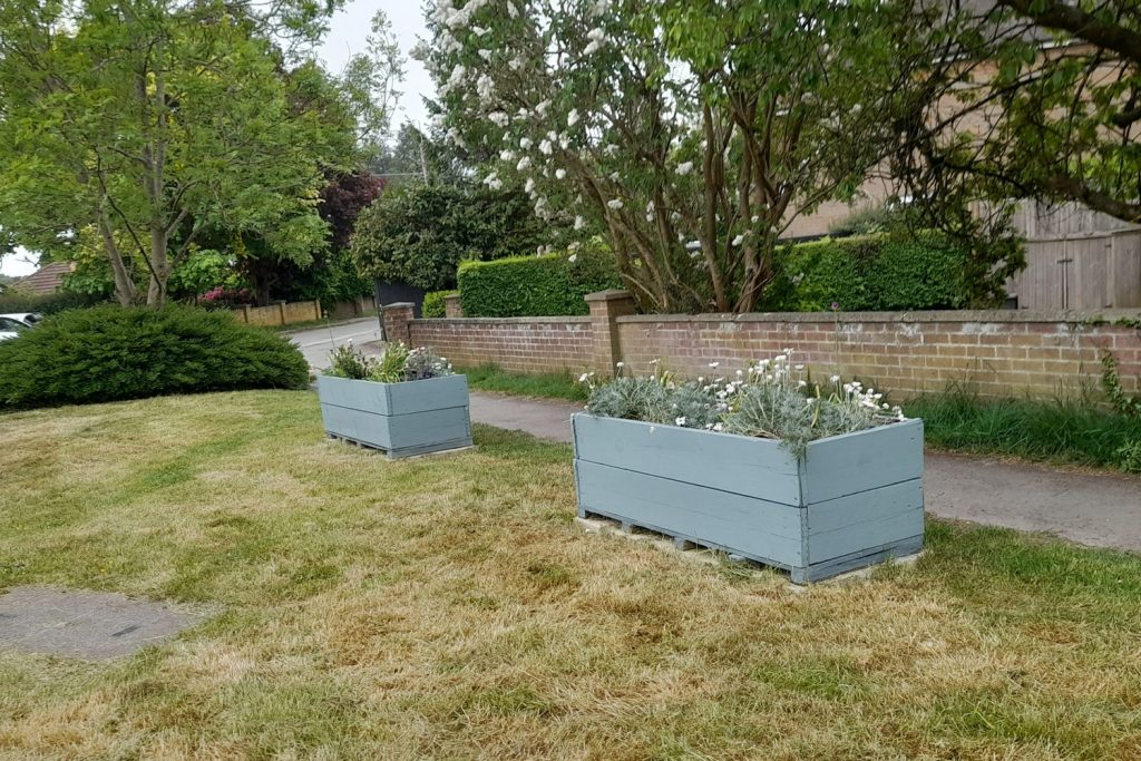 planters installed by prestwood community association at junction of high st and nairdwood lane
