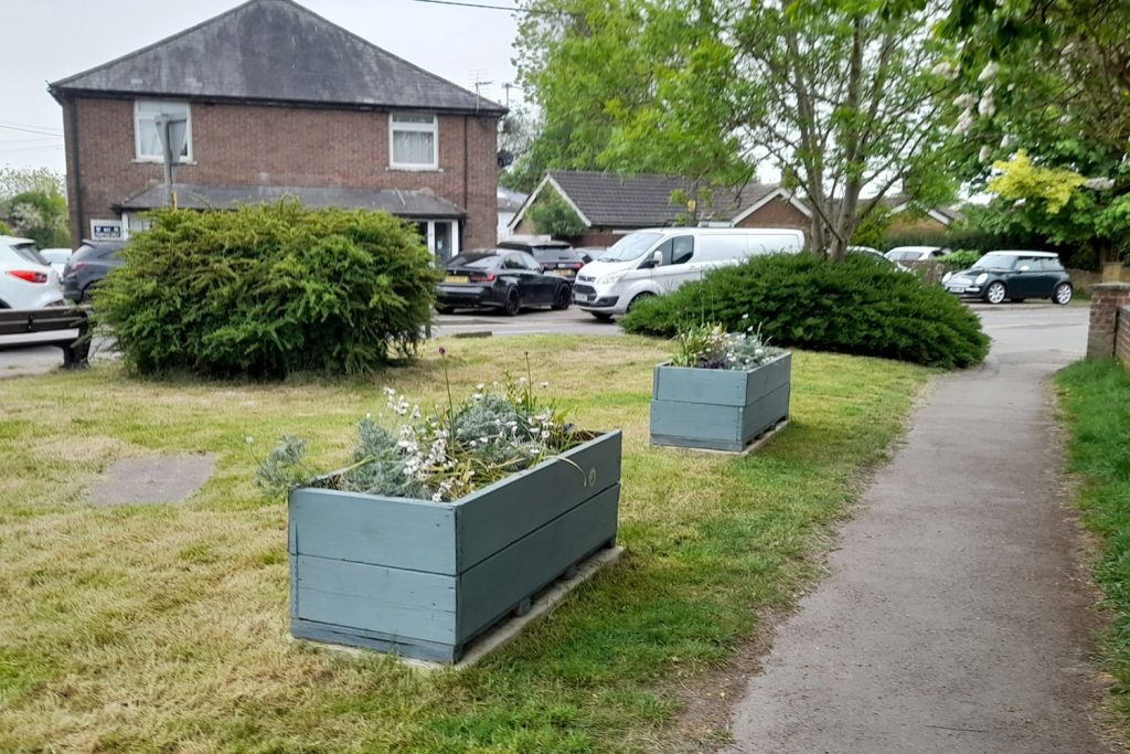 planters installed by prestwood community association at junction of high st and nairdwood lane